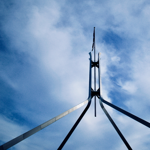 image of the top of the Parliament House building in a blue skye